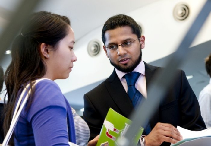 An employer talks to a student.