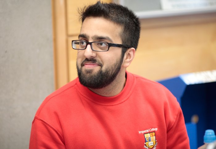 A student in an Imperial sweatshirt.