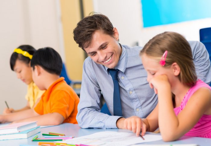 Teacher with pupils