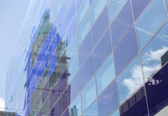 Reflection of the Queen's Tower in the Faculty Building windows