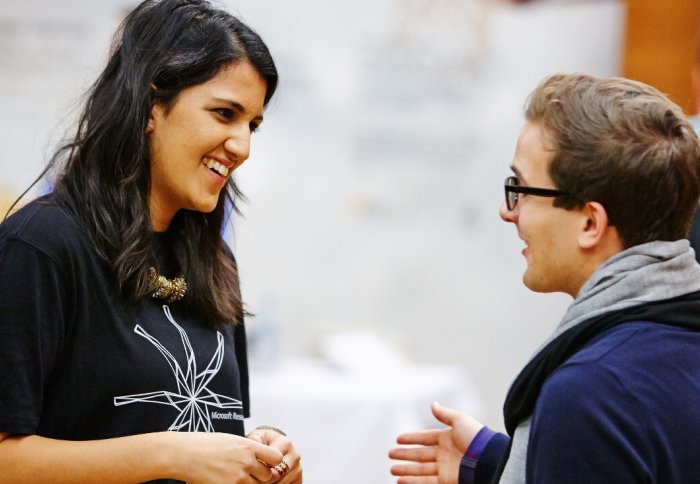 An employer talking with an Imperial student.