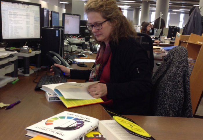 Library staff cataloguing Man Booker shortlist titles