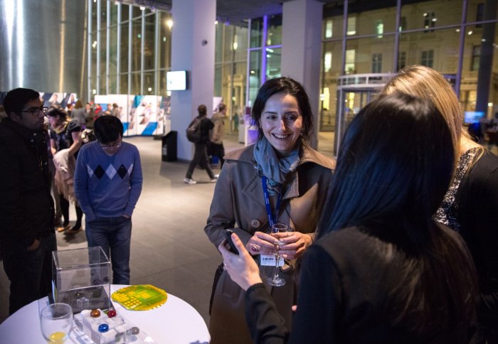 Women at Imperial networking at an event.