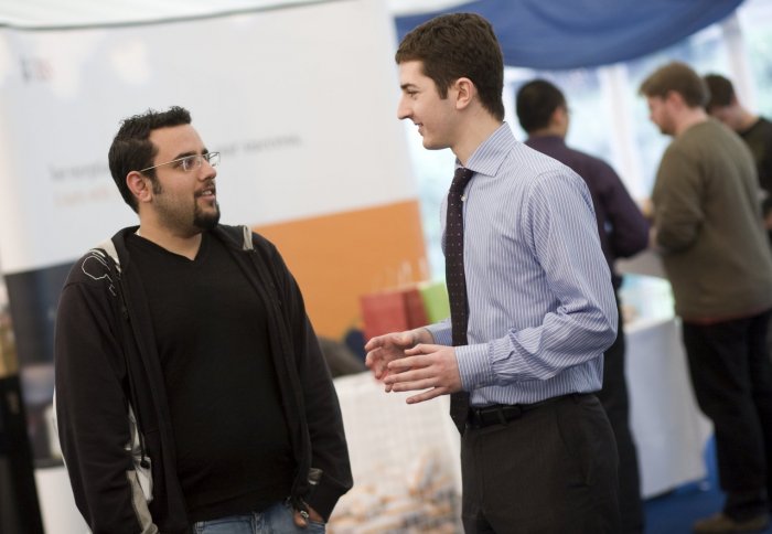 students and recruiters at Fairs in the marquee