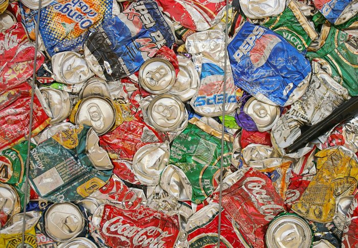 Crushed drinks cans in recycling