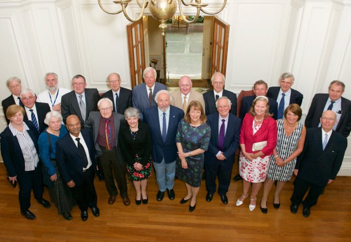 Attendees gather with President Alice Gast