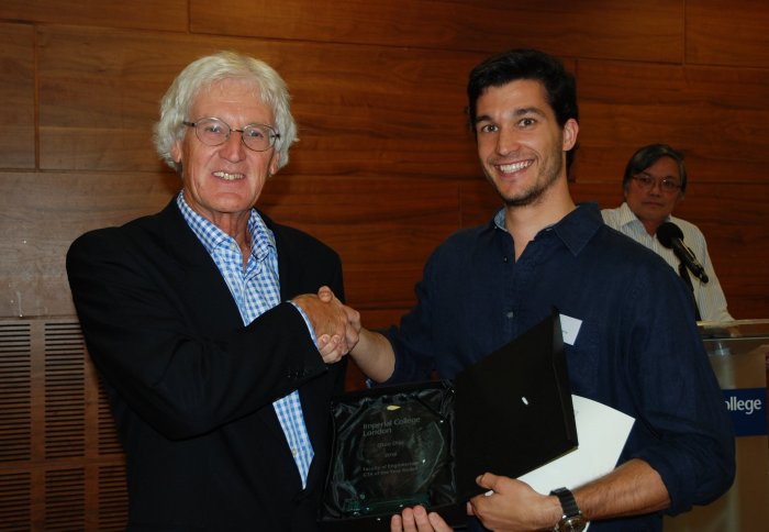 Elton Dias receiving his award from Professor Jeff Magee, Dean of the Faculty of Engineering