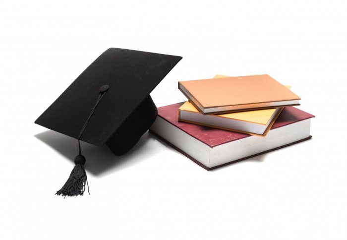 Graduation cap and books