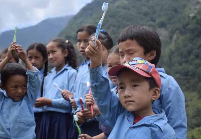 Handing toothbrushes out in rural Nepal