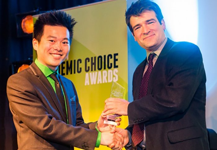 Dr James Wilton-Ely collecting his prize at the 2014 Student Choice Awards