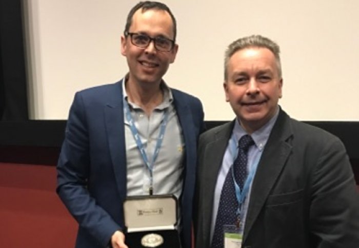 Dr Joao Cabral from Imperial College receiving the McBain medal during the meeting at the SCI