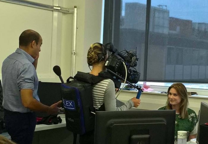 Dr Ravi Vaidyanathan and student Fiona Boyce in the lab with the BBC team