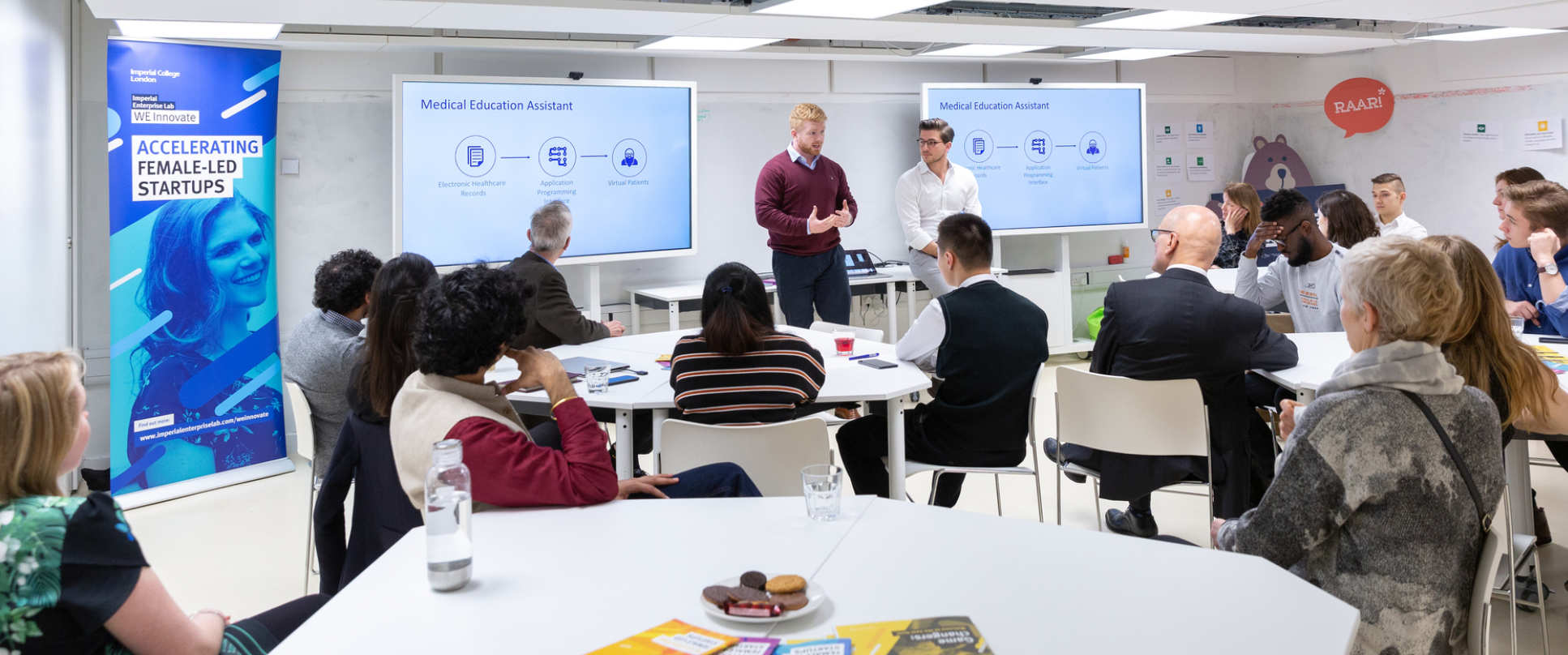 Students presenting in the Enterprise Lab