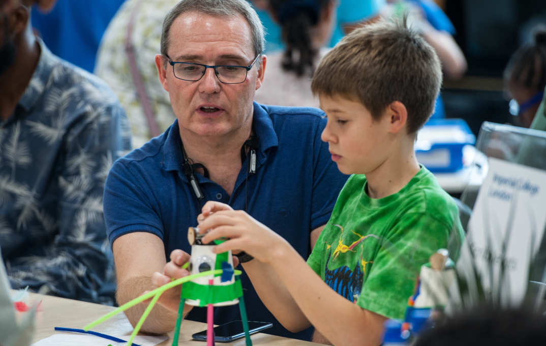 A father and son make a scribblebot
