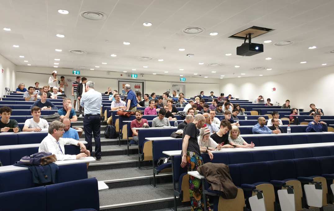 The theatre fills up for the public lecture