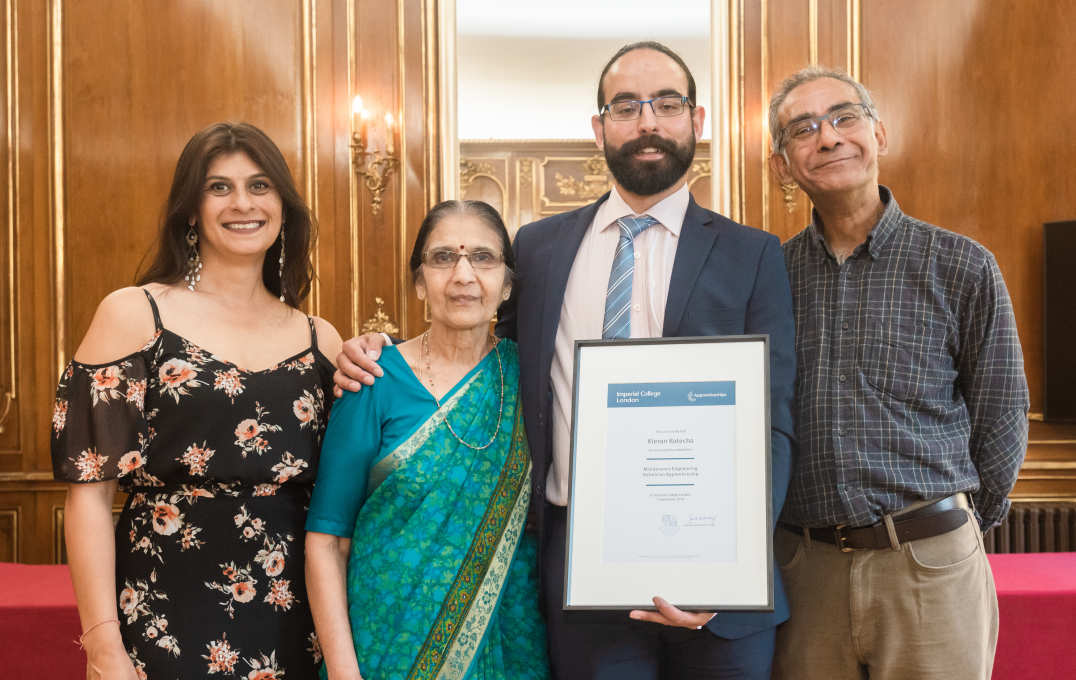 family pose for photo