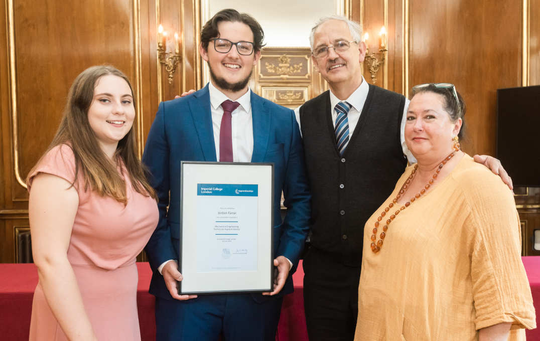 family pose for photo