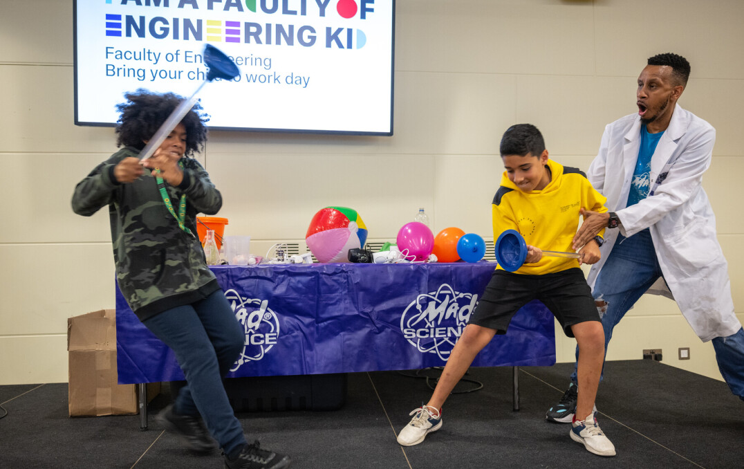 Two children on stage during a fun science show