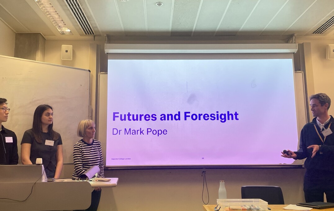 Miark Pope presenting slide "Futures and Foresight"