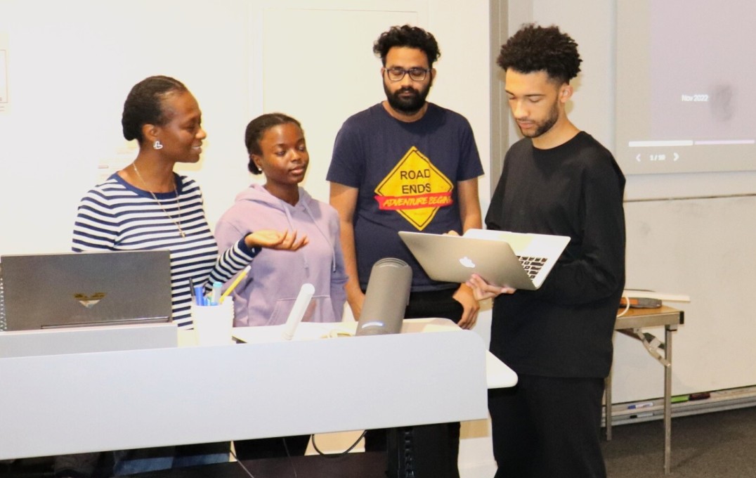 Group photo of participants presenting