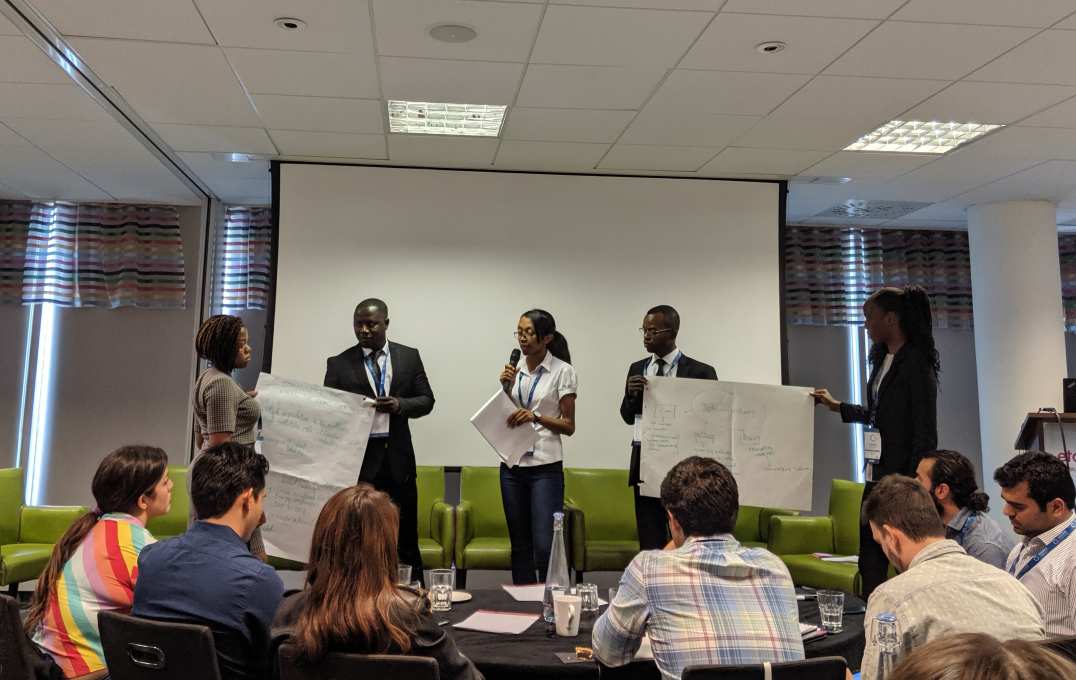 Students talking in seminar room