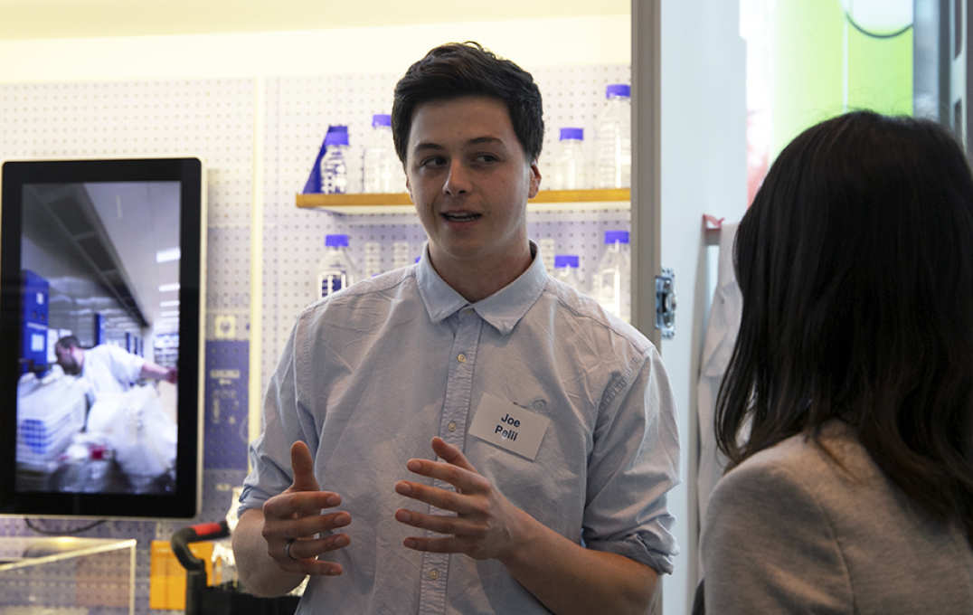 Student presenting a poster