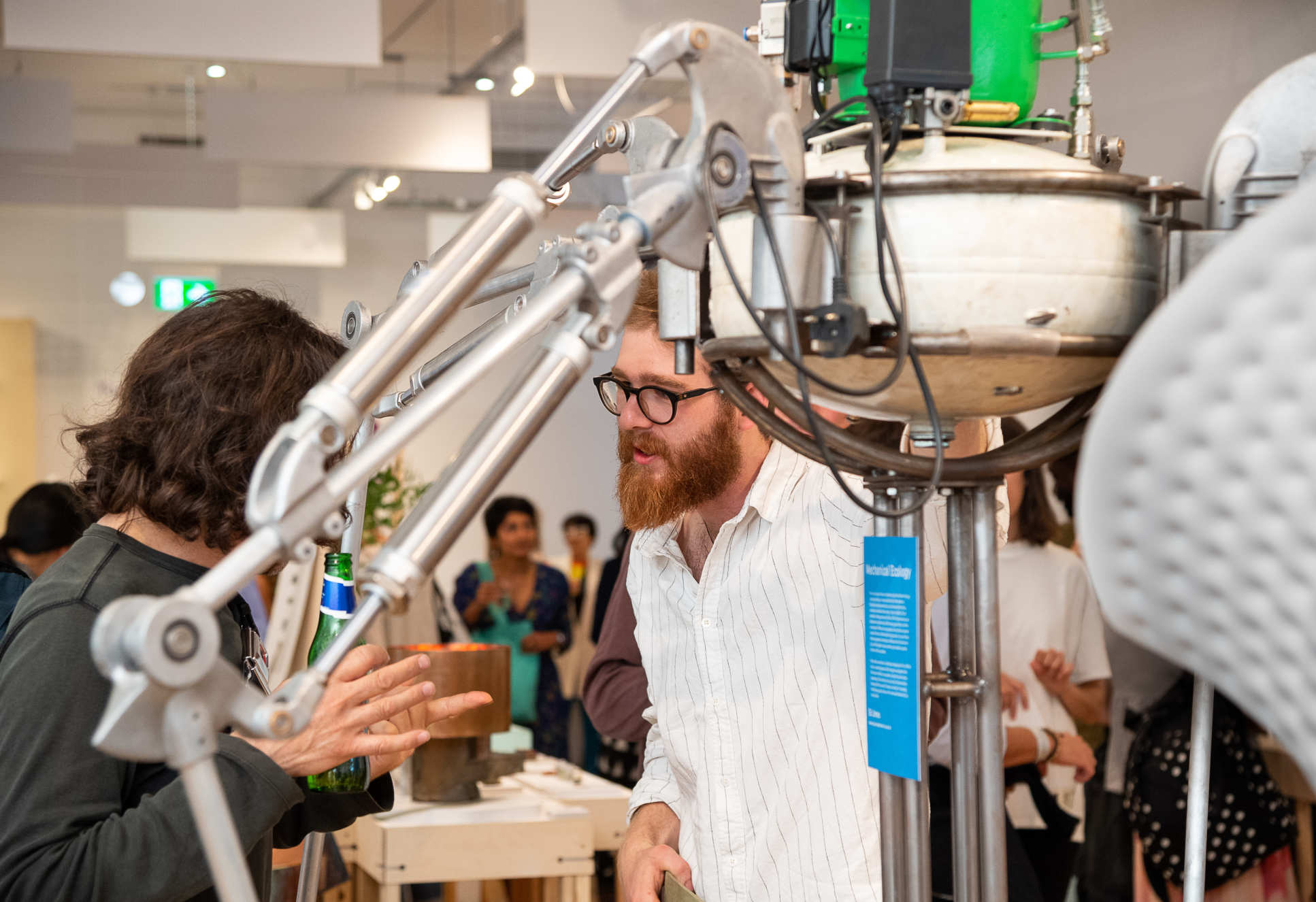 Visitors to the exhibition talking