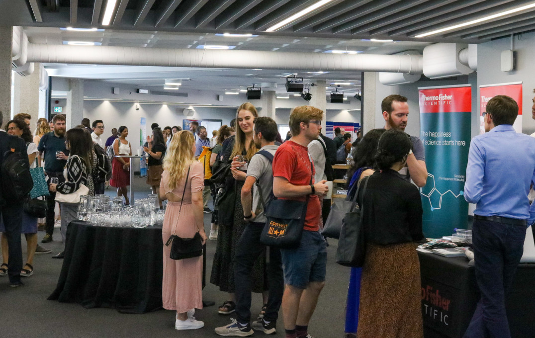 People in a room talking