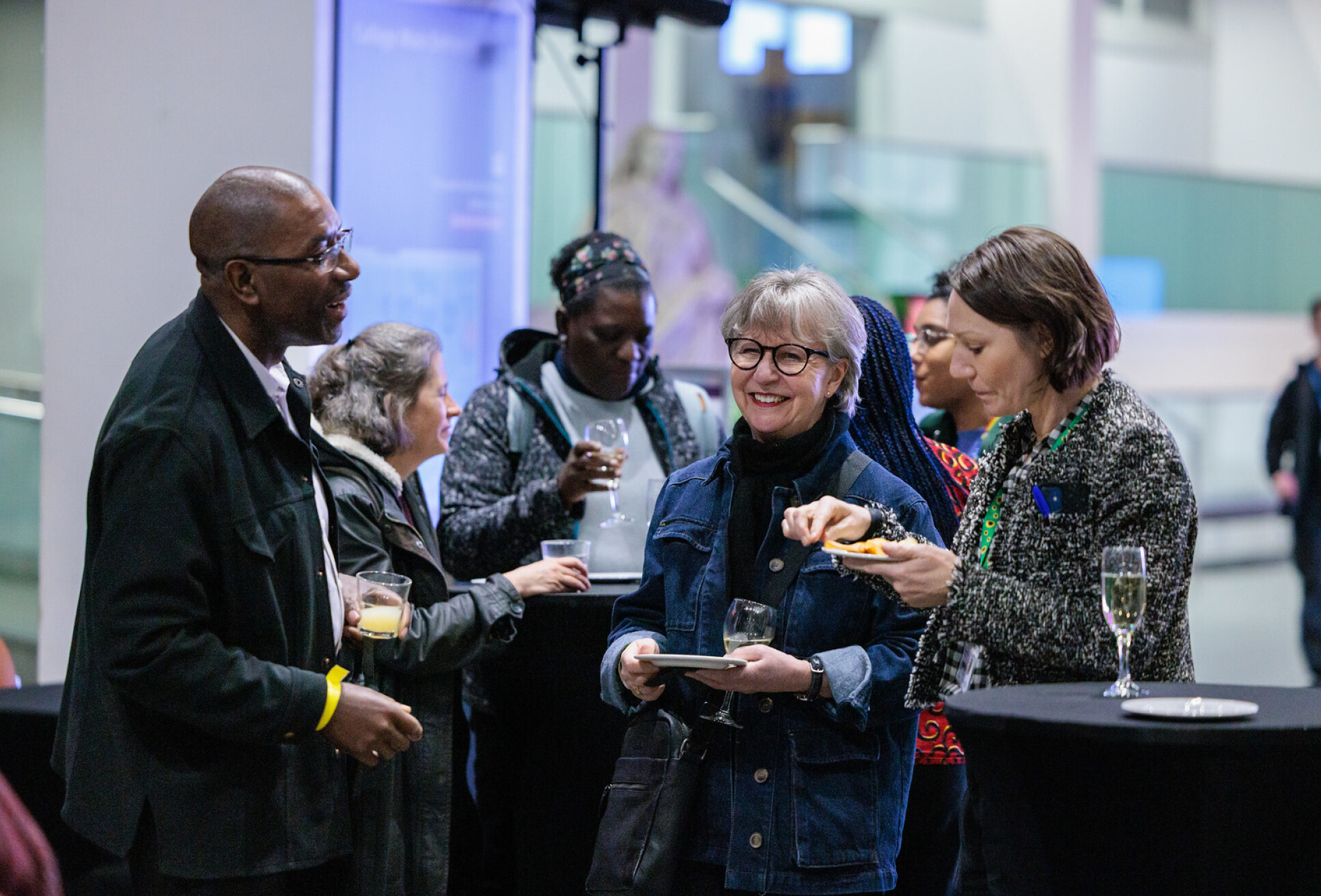 Attendees mingling at the Creative Connections opening events