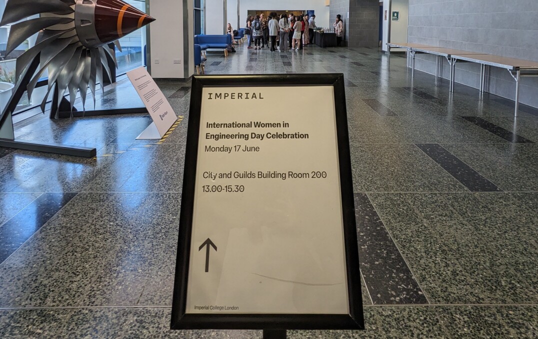 A sign on a stand describing the event date and time