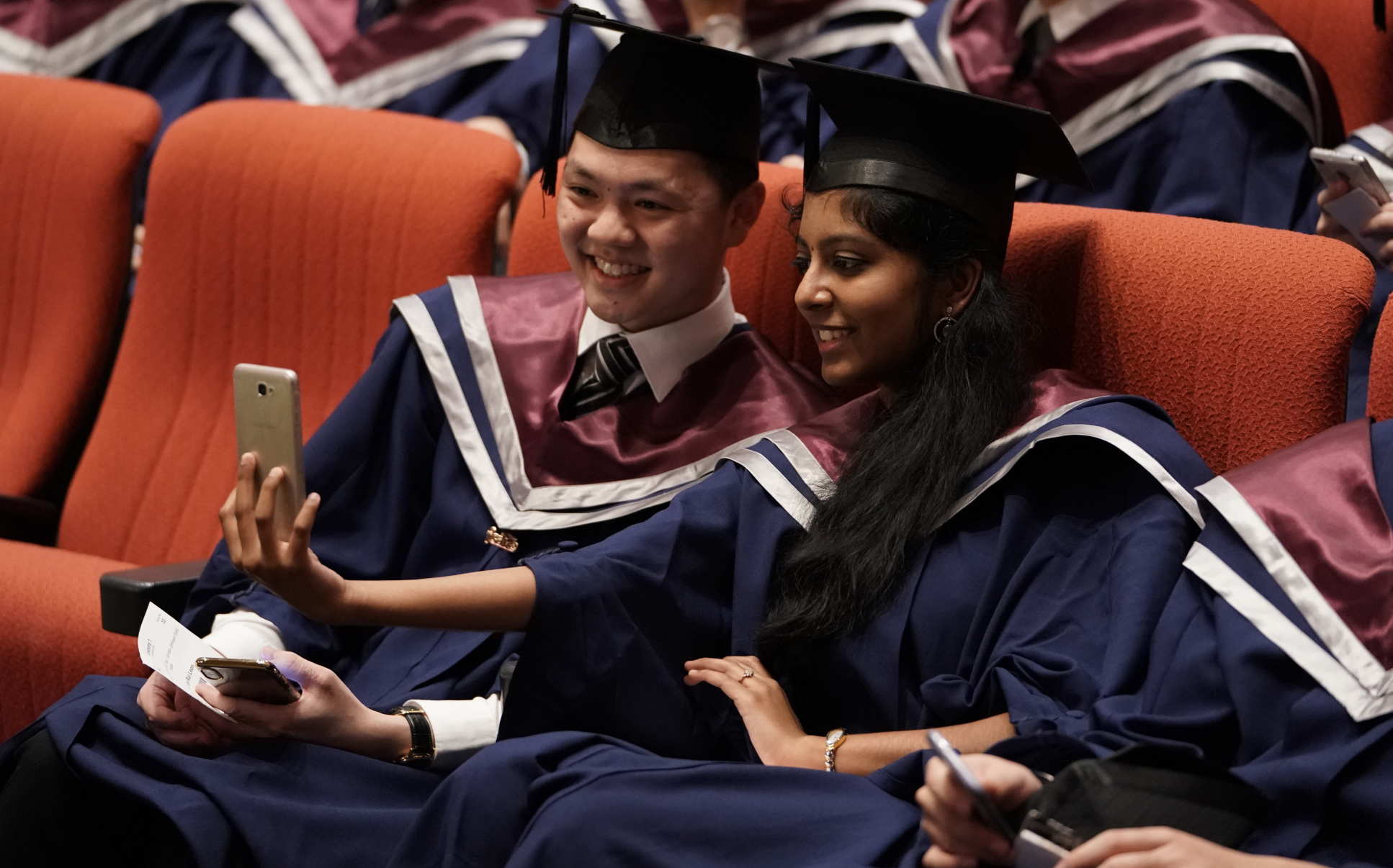 Graduates take a selfie